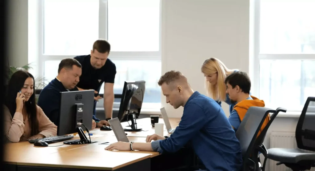 GENENSE studio team working on 3D architectural rendering projects, photo by GENENSE